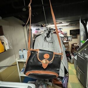 Dooney & Bourke Black Pebbled Leather Bag with Brown Logo Patch GUC